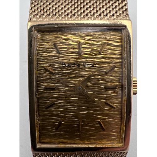 499 - A 9ct gold Bueche Girod bracelet watch, rectangular shape, champagne dial. Case: 21mm. 18.5cm l. 50.... 