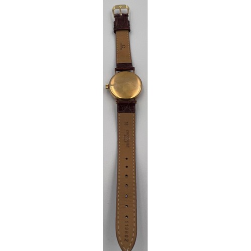 507 - A Vertex 9ct gold cased wristwatch with subsidiary seconds dial and brown leather strap.

Winds and ... 