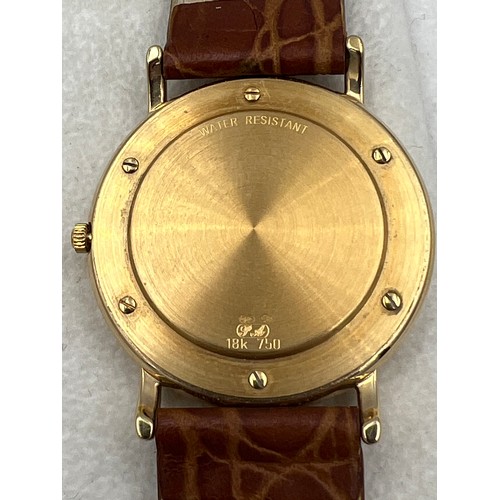 508 - An 18ct gold cased boxed Tissot wristwatch with brown leaf strap.

Winds and goes, very good conditi... 