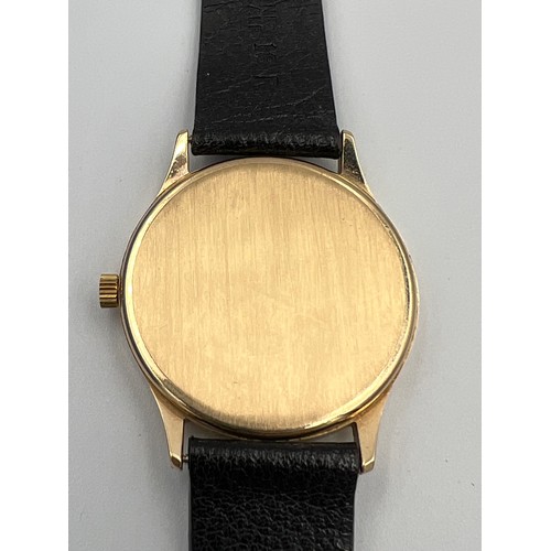 509 - A boxed 9ct gold cased Garrard wristwatch with leather strap.

Very good condition.