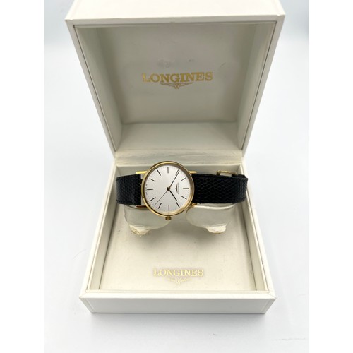 513 - A boxed Longines manual wristwatch with gold plated and stainless steel case, silver face and leathe... 