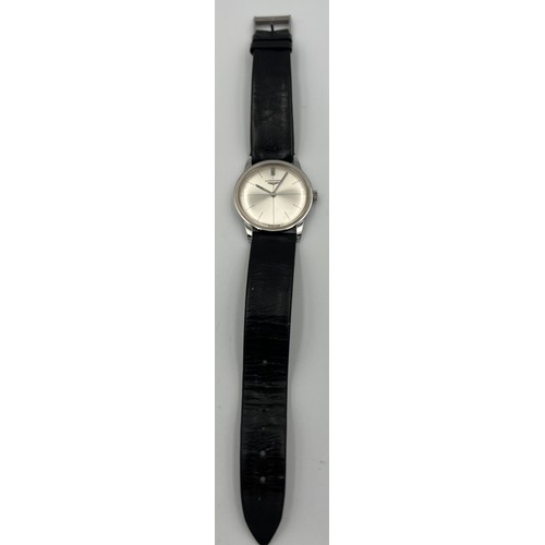 515 - A 1970's Longines manual wristwatch with silver face and leather strap.

Winds and goes. Very good c... 