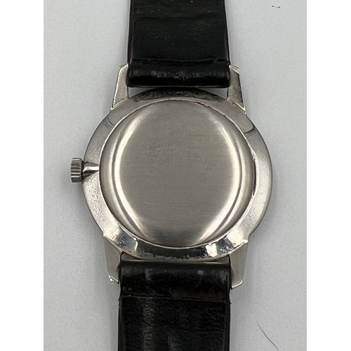 515 - A 1970's Longines manual wristwatch with silver face and leather strap.

Winds and goes. Very good c... 