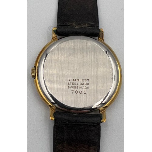 517 - A 1980's Raymond Weil Roman Numeral Geneve gentleman's wristwatch.

Winds and goes. Purchase receipt... 