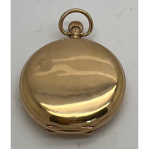 486 - A nine carat gold Waltham hunter pocket watch with white enamel dial and subsidiary second dial. Wei... 