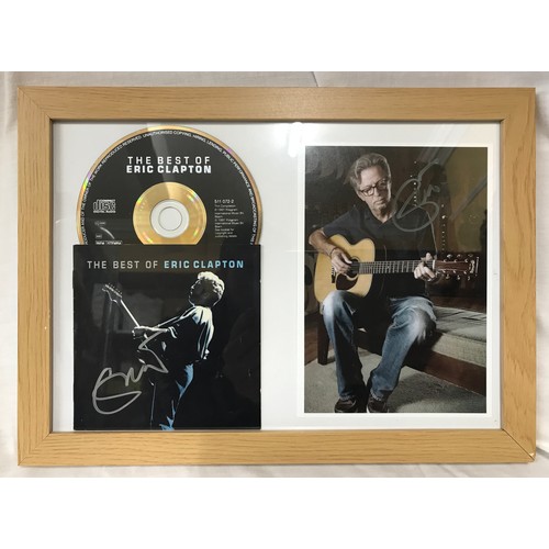 1279 - Signed and framed photograph and CD by Eric Clapton. Eric Patrick Clapton CBE (born 30 March 1945) i... 