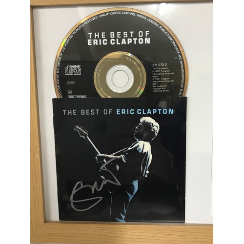 1279 - Signed and framed photograph and CD by Eric Clapton. Eric Patrick Clapton CBE (born 30 March 1945) i... 