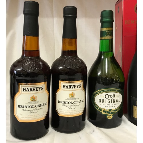 710 - Two 70cl bottles of Remy Martin VSOP cognac, one 70cl V.S. Cognac Courvoisier and one 1 litre Napole... 