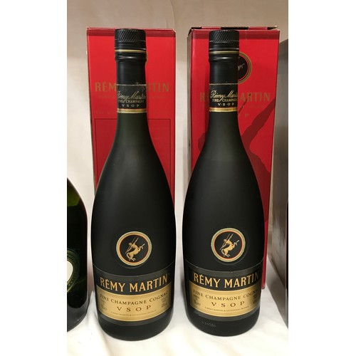 710 - Two 70cl bottles of Remy Martin VSOP cognac, one 70cl V.S. Cognac Courvoisier and one 1 litre Napole... 