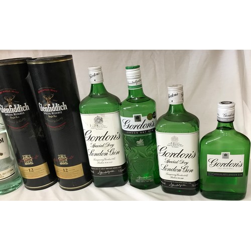 711 - Two bottles of 70cl Glenfiddich Special Reserve whisky aged 12 years along with a 70cl bottle of Bac... 