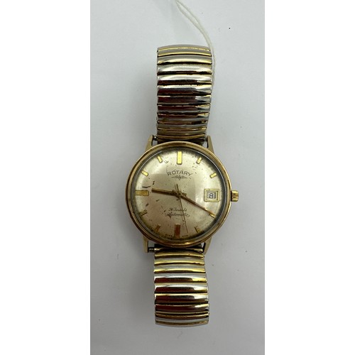 524 - A gentleman's 9 carat gold cased Rotary wristwatch with date aperture on gold plated expanding brace... 