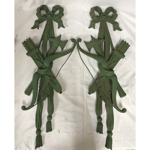 184 - Two matching pairs of ornamental carved wall decorations depicting arrows and a quiver painted green... 