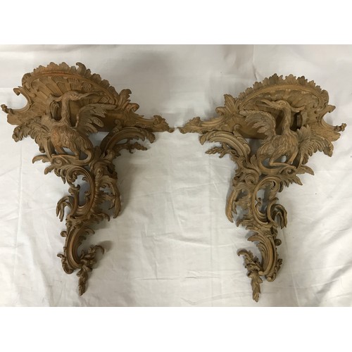 185 - Pair of ornate wooden carved shelves depicting birds measuring 46cm h x 44cm w by Douglas Brickwood,... 