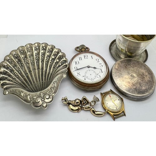 769 - A miscellany to include Goliath pocket watch, travel cup, shell shaped dish, wristwatch etc.