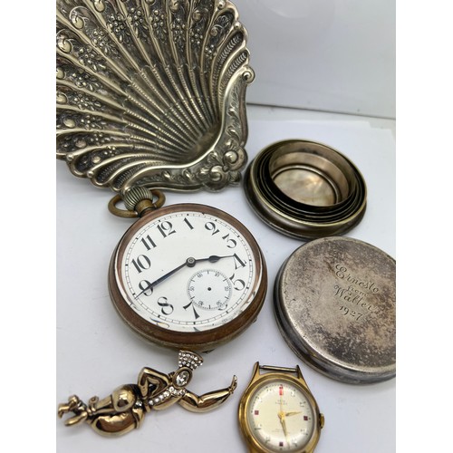 769 - A miscellany to include Goliath pocket watch, travel cup, shell shaped dish, wristwatch etc.