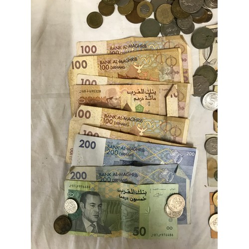 655 - A quantity of foreign coins and notes: 1,050 Dirhams of Morocco, 1,000 Lire, others to include Cypri... 