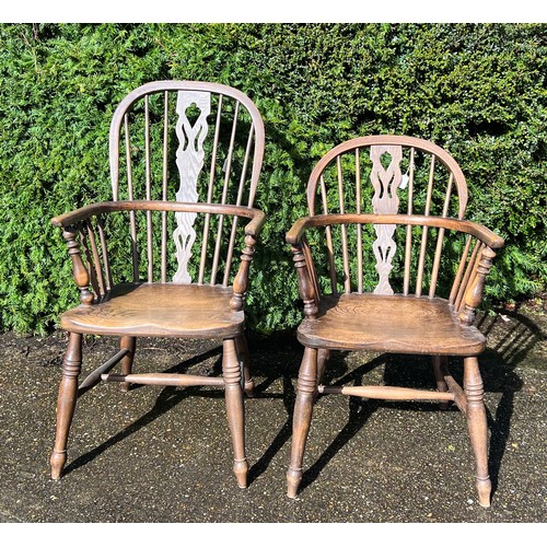 34 - Two 20thC Windsor chairs, one high backed. 103cm h and 90cm h.