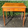 Two drawer mahogany side table. 73cm w x 38 d x 77 h.