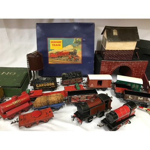 902 - A collection of Hornby trains along with tracks and homemade buildings, bridges and stations. Hornby... 