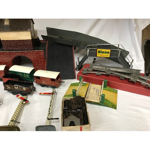 902 - A collection of Hornby trains along with tracks and homemade buildings, bridges and stations. Hornby... 