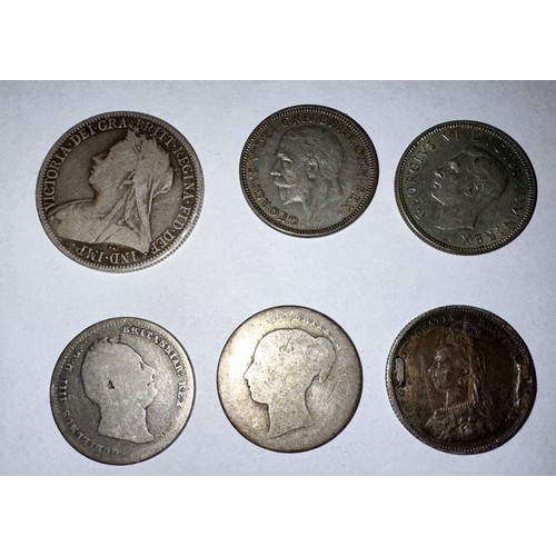 658 - Coins to include 1887 silver Sixpense, 1835 One Shilling and three others, and a 1900 Two Shillings.