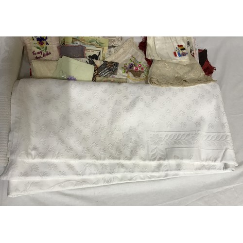 1048 - A very heavy white damask banqueting tablecloth 254cm x 232cm and another with tassels 225cm x 180cm... 