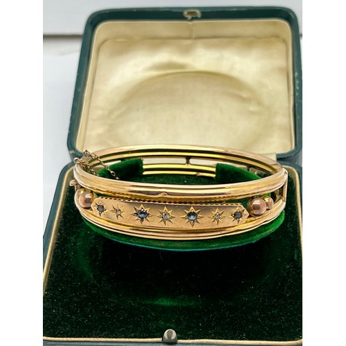 429 - An early 20thC 9 carat gold bracelet set with sapphires and diamonds in original velvet and silk lin... 