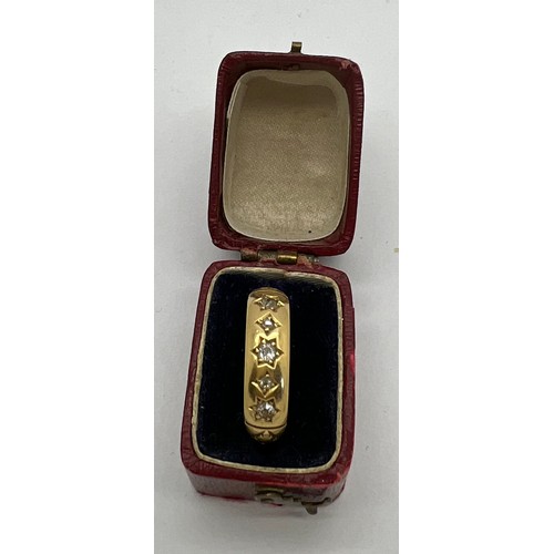 432 - An 18 carat gold ring set with diamonds in original presentation box. Weight 2.7gm. Size O.