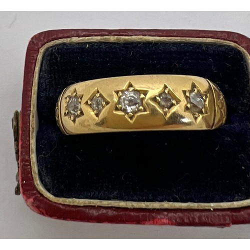 432 - An 18 carat gold ring set with diamonds in original presentation box. Weight 2.7gm. Size O.