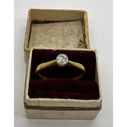 438 - Solitaire diamond ring set in yellow metal, marks rubbed. Weight 1.5gm. Size K.