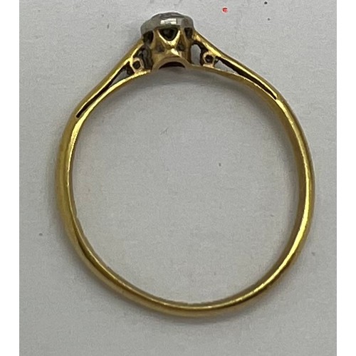 438 - Solitaire diamond ring set in yellow metal, marks rubbed. Weight 1.5gm. Size K.