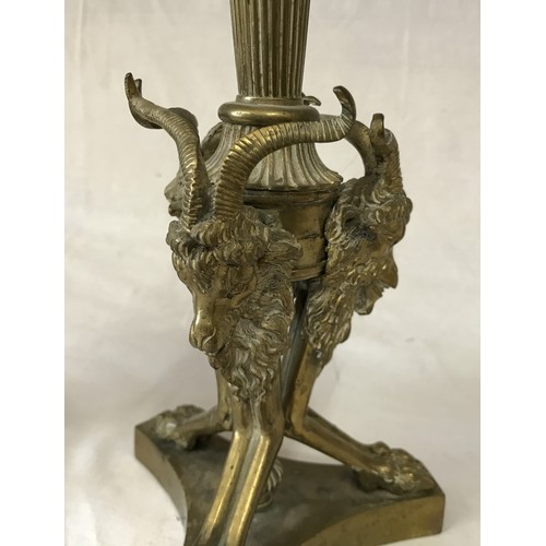 742 - A gilt metal five branch candelabra 58cm h, along with a pair of ornate brass candle sticks decorate... 