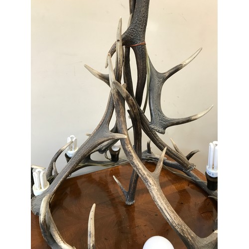 748 - A large antler chandelier with 6 electronic bulb fixtures approx. 80h x 60cm w.