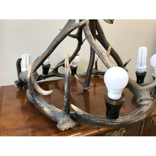 748 - A large antler chandelier with 6 electronic bulb fixtures approx. 80h x 60cm w.