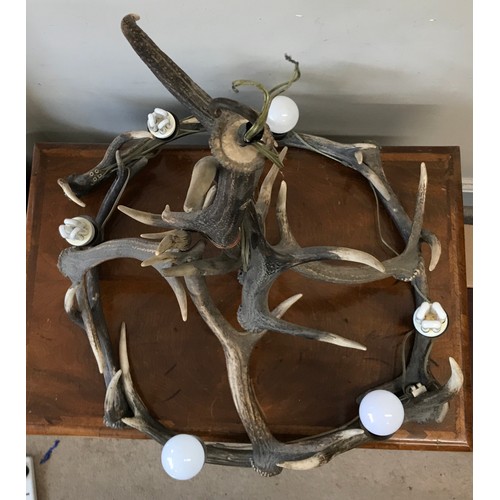 748 - A large antler chandelier with 6 electronic bulb fixtures approx. 80h x 60cm w.