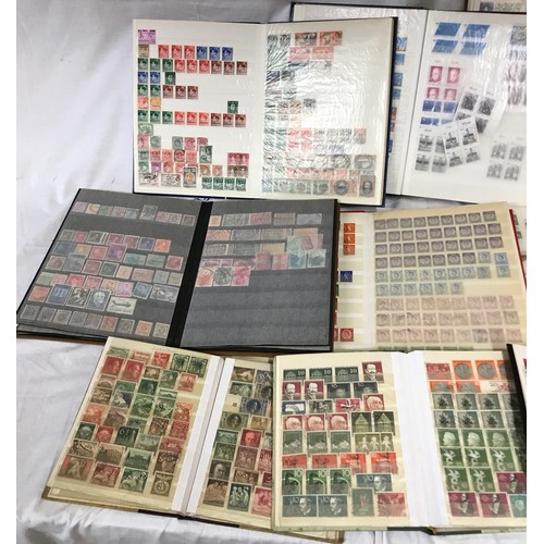 666 - A collection of stamps to include eleven stock books and cover albums containing world stamps, stren... 