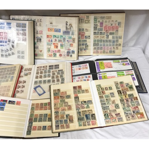 666 - A collection of stamps to include eleven stock books and cover albums containing world stamps, stren... 