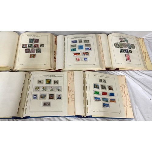 667 - A collection of stamps to include five printed Schaubek albums with hingless mountings comprising of... 