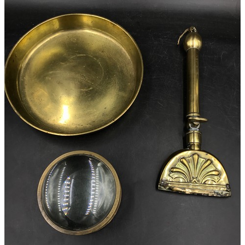 1005 - A collection of brass items to include a pair of matching cherubs, horn wrapped in leather, back scr... 