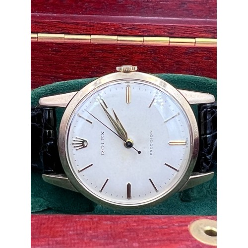 529 - A 1960's 9ct gold Rolex Precision gentleman's presentation wristwatch with cream dial on black leath... 