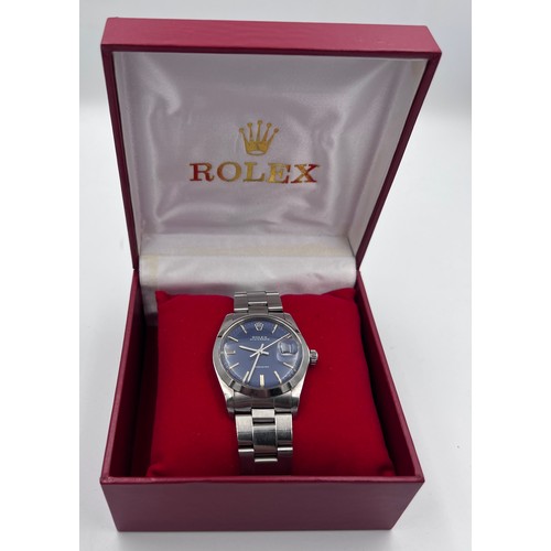 534 - A Rolex Oysterdate Precision stainless steel wristwatch with blue face, on Rolex stainless steel bra... 