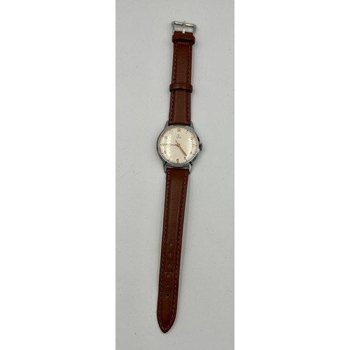 539 - A Tudor vintage wristwatch on brown leather strap on Rolex stainless steel case. 32mm case.

Winds a... 