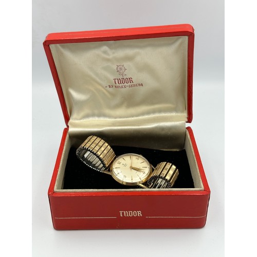 543 - A 1960's 9ct gold presentation Tudor wristwatch on gold plated expanding bracelet, Rolex case marked... 