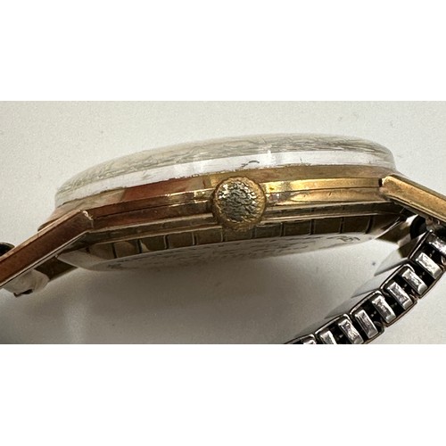 543 - A 1960's 9ct gold presentation Tudor wristwatch on gold plated expanding bracelet, Rolex case marked... 