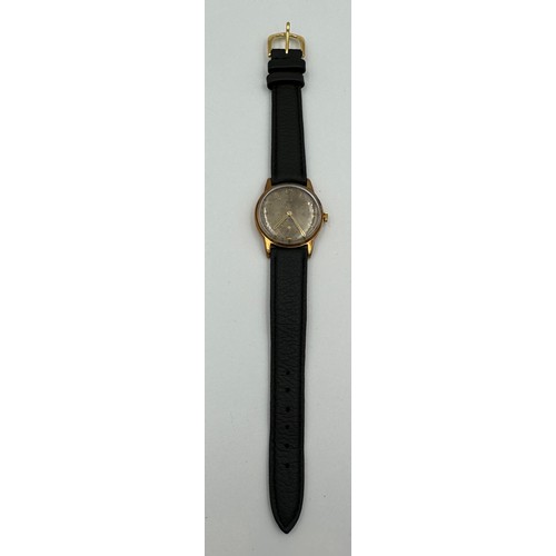 599A - A 1954 9ct gold gentleman's Super Gents Tudor wristwatch with subsidiary seconds dial. 31mm case. In... 