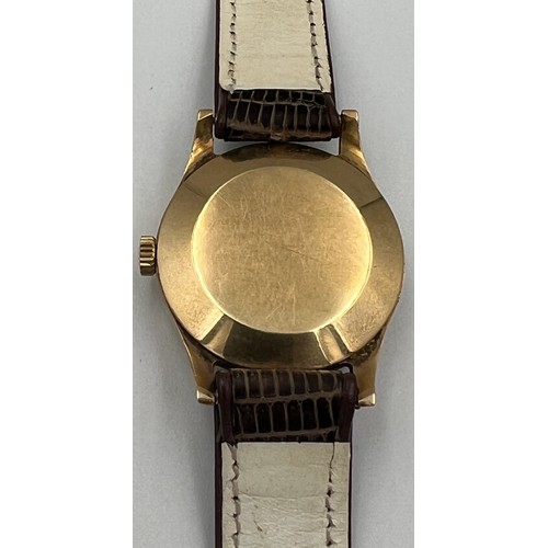 546 - A boxed 9ct gold gentleman's precision Rolex wristwatch on brown leather strap with blue and gold ha... 