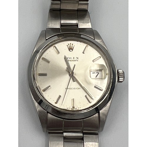 A boxed gentleman's Rolex Oysterdate Precision wristwatch, steel case on steel Rolex bracelet. 35mm case. Ref: 6694. Serial No: 2908****.  with an original smaller strap.

Winds and goes, slight chip to edge of glass, new Rolex strap fitting in 2018, receipt with item.