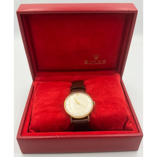 550 - A boxed gentleman's 9 carat gold Rolex Precision wristwatch with silver face and gold hands on a bro... 