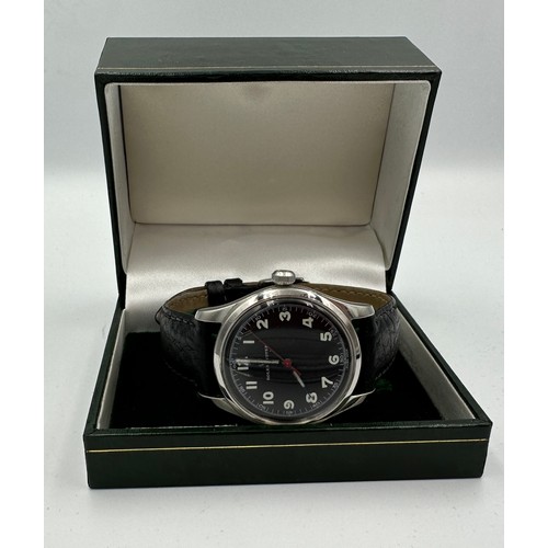 552 - A c1947 black dial military style Rolex Oyster with luminous hands and numbers. Tudor case and movem... 