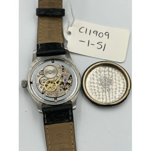 552 - A c1947 black dial military style Rolex Oyster with luminous hands and numbers. Tudor case and movem... 